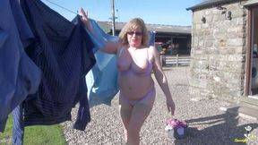 Trisha hanging out the washing