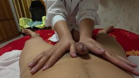 My doctor is performing a traditional Chinese massage technique called dragon tendon manipulation on me.