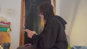 SANDY - I light my cigarette while my hair is wet fresh out of the shower and I'm texting on my phone.