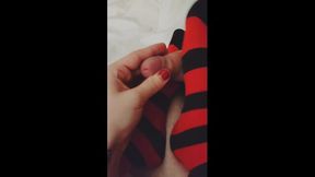 Footjob in stripped Thigh High Socks