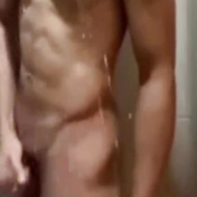 guy taking a shower while jerking off his dick