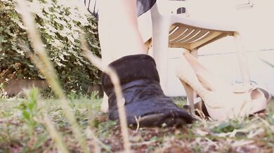 Giantess steps on her foot slave all day in the garden high heels trample