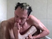 Licking my feet soles and fingers while in the bathtub putting Legs over my head to stretch