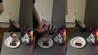 Watch how this hot femboy guzzles coffee and gives a hot handjob