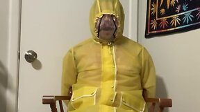 Pvc raincoat bondage part 2: yellow