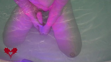 Sex in the hot tub. She masturbates and I cum on her tits.