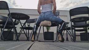 DENIM & LEATHER BOOT GODDESS CRUSHES TEDDY BEAR FACE WITH HER ASS ON A CHAIR.