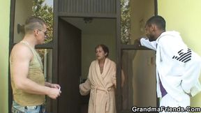 Old Grandma Takes Two Big Cocks From Both Sides