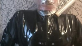 Breath play in latex catsuit with cling film