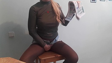 Pissing on a newspaper