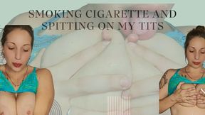 Smoking cigarette and spitting on my tits