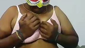 Chubby dark skinned webcam masked Desi whore plays with boobies
