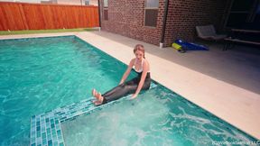 Kate Dives in the Pool Wearing a Black and Shiny Jumpsuit