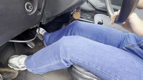 Dalilah drives the Fiat 1 in the parking lot.