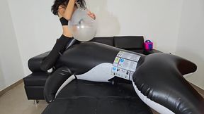 Marianna blows up balloons with her inflatable whale PART 1