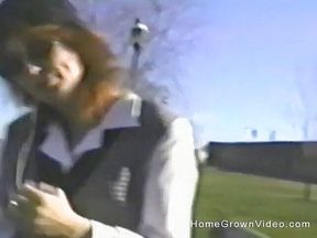 Gum chewing tramp flashes outdoors