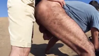 Bear strangers meet for raw outdoor anal on a sandy dune