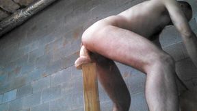 Naked Jon Scarecrow plundering his ass with a giant dildo in heels