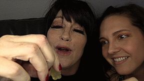 Giantess Sadie Holmes & Sherry Stunns Devours Shrunken Gummy Men (SD 720p WMV)