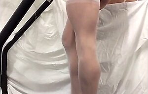 Crossdresser in White Stockings on Treadmill