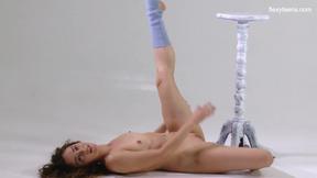 ”Ursula Fe brunette curly hair gymnast”