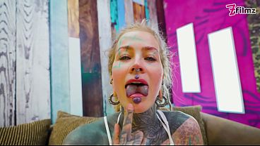 Heavily tattooed solo girl in lingerie masturbates hard with big dildo