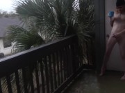 Nudist enjoys his morning wood with coffee on the balcony