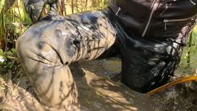 Sexy girl in all leather clothes stuck in deep mud