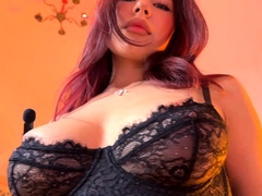 Big boobed Marilyn Scott sucks and tit fucks a huge cock