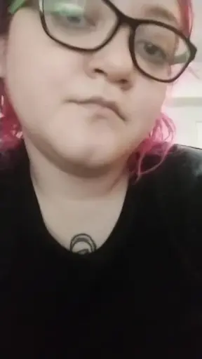 Double amputee beauty squeezes her big natural tits while playing with her
