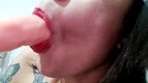 Latin babe with tattoo gives a hot blowjob