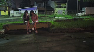 Two hot girls caught him masturbating inside the car and helped him cum.