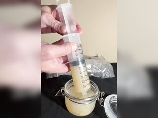 Loading two large sized syringes of my thawed cum loads to inject into my wife’s twat