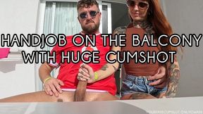 HANDJOB WITH HUGE CUMSHOT ON THE BALCONY!