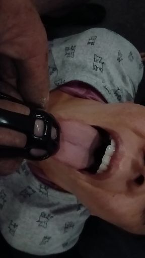 Busty babe gets a sloppy blowjob while wearing a chastity belt