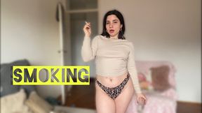 Sexy tattooed model smokes Marlboro red