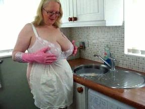 My phat mature Russian wife does kitchen work exposing her huge tits