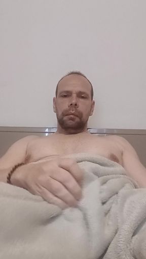 I hide my big erection under the blanket