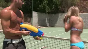 Hot Outdoor Bikini Party Where Squirt Guns Meet Oil-Slicked Pumped Cocks