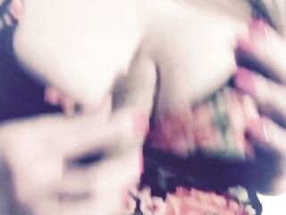 Carlycurvy teases with her sex-toy in a short flower costume