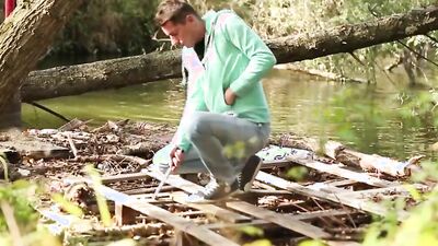Cute couple in love is enjoying sensual intercourse out in the woods