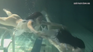 Siskina and Polcharova are underwater gymnasts