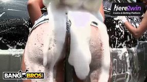 Busty Latina with phat knockers and a giant rump washes her car outdoors