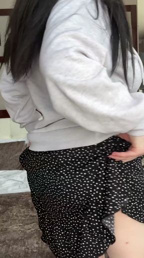 Woman in black and white polka dot shorts