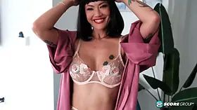 Asian MILF Kitty, 42, fingers her mature pussy