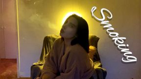 Sexy alternative girl smokes in the dark