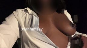 walking outdoors in a white blouse and light up butt plug