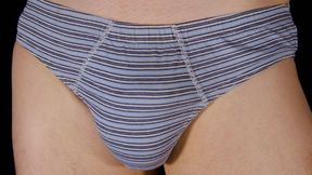 Close up strip to underpants then show flaccid shaved uncut penis and foreskin for everyone to see