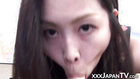 Handsome Oriental vixen stuffs mouth with plastic meat