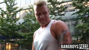 Hunks measure their strenght with an arm wrestling contest